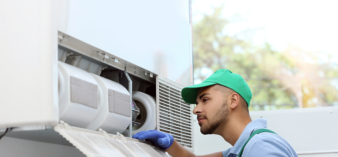 A tech looking at a unit