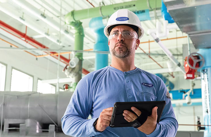 A carrier tech holding a tablet