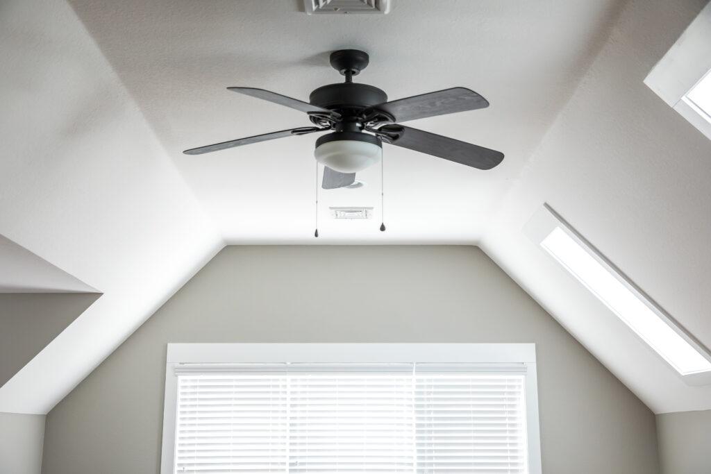 Balck Ceiling Fan in White Room